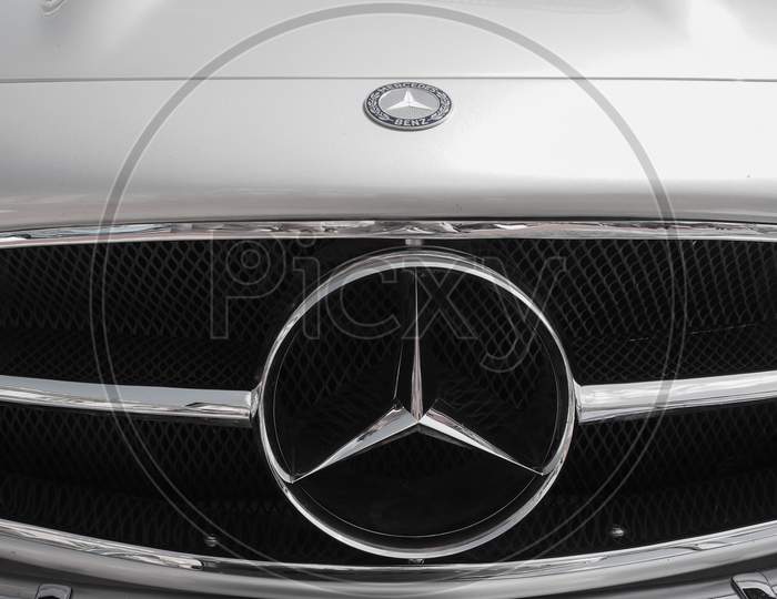 Berlin, Germany - Circa June 2019: Mercedes-Benz Logo On Car Hood And Grille