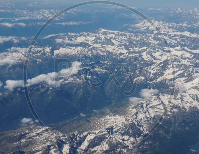 Aerial View Of Alps Mountain