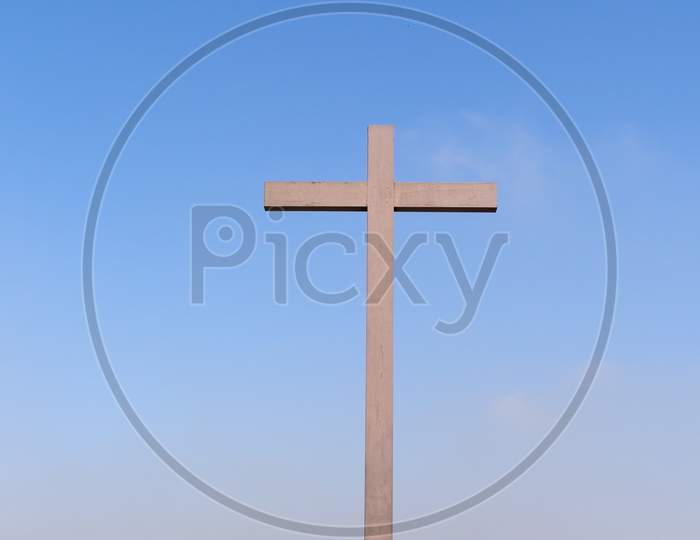 Wooden Cross Over Blue Sky