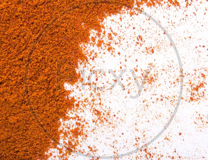 Red Pepper Powder Isolated On White Stock Photo