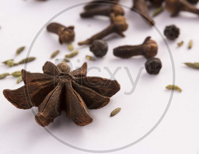 Spices: Anise Stars Cloves And Cardamom Stock Photo