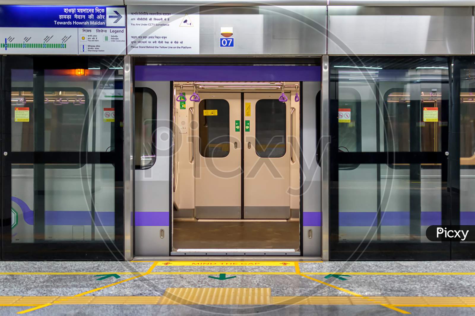 Metro Train Stopping At A Station And Open The Door To Wait For Passengers To Enter During The Rush Hour At Metro Station Of Kolkata East West Metro System Kolkata.