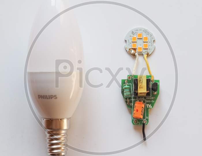 Amsterdam, Netherlands - Circa February 2018: Philips Led Light Showing Internal Electronic Components On A Printed Circuit Board