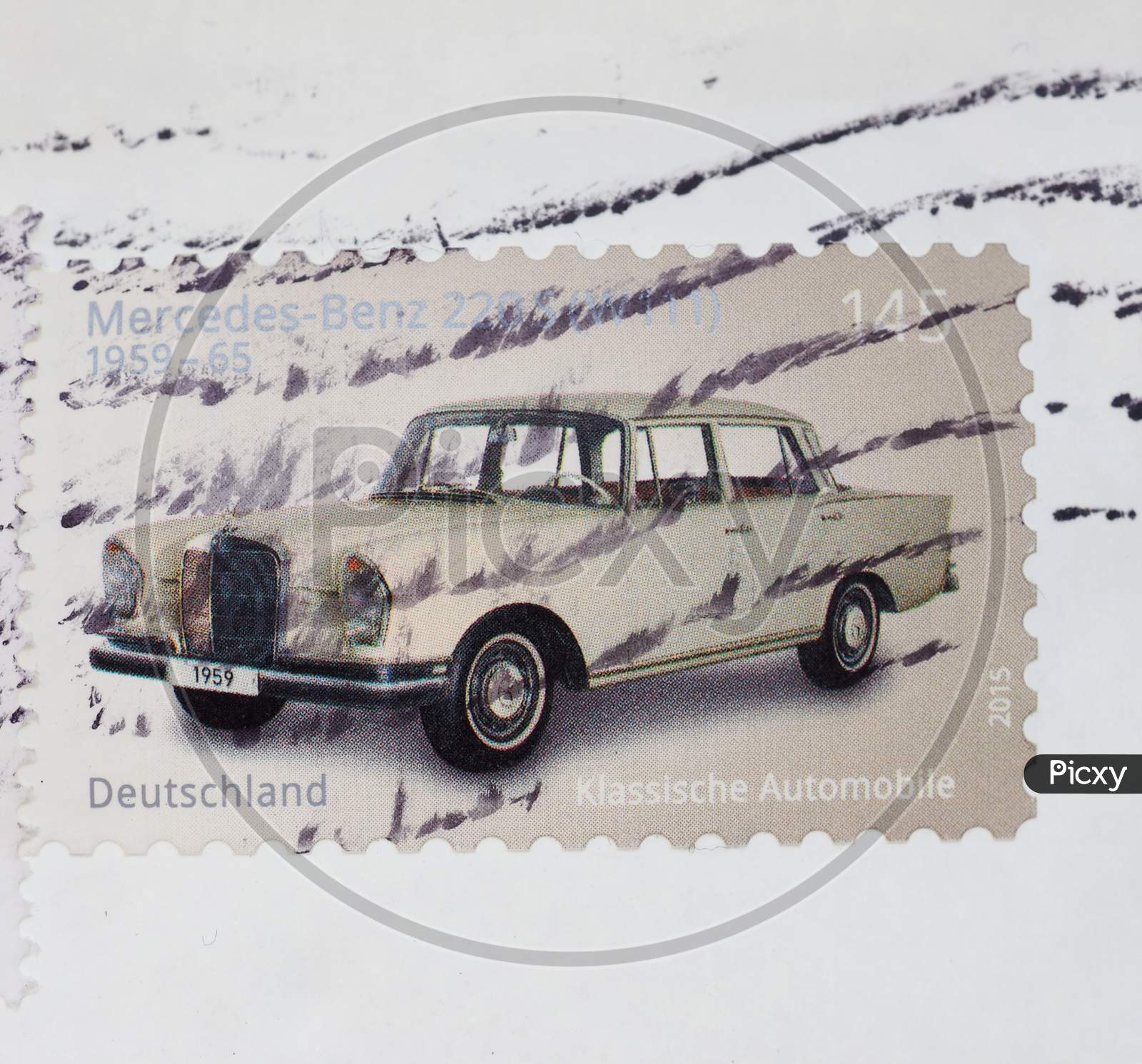 Berlin, Germany - July 31, 2015: Stamps Printed By Germany Show A Classic Mercedez Benz Car