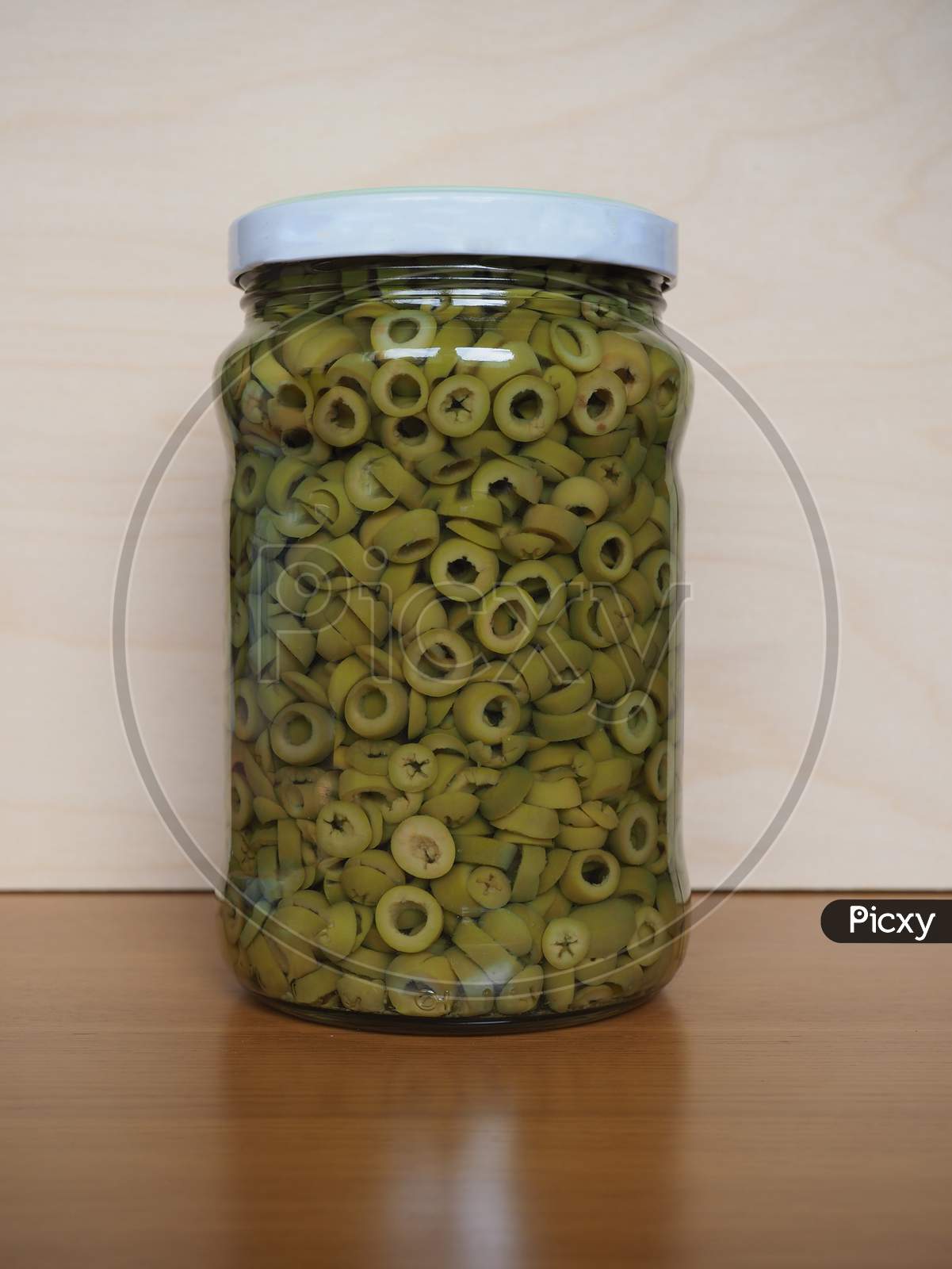 Sliced Green Olives In Brine In Glass Jar