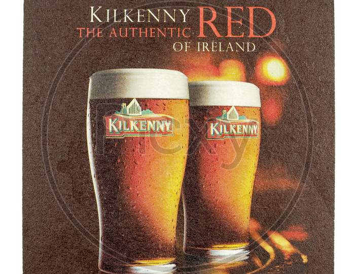Dublin, Ireland - March 15, 2015: Beermat Of Irish Beer Kilkenny Isolated Over White Background