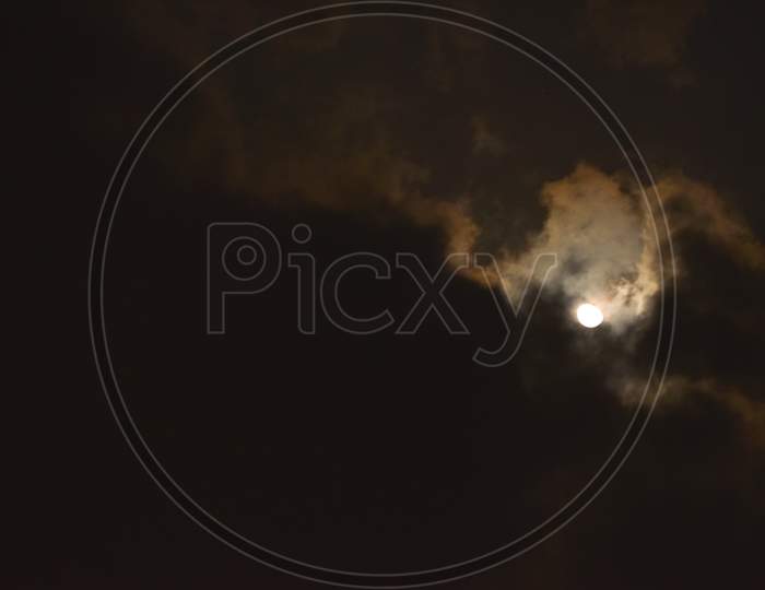 Cloud At Night With Moon Behind