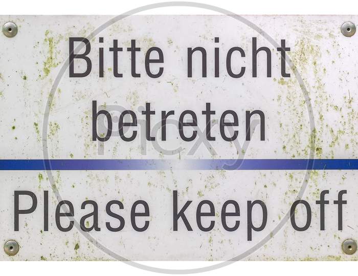 German Sign Isolated Over White. Please Keep Off.
