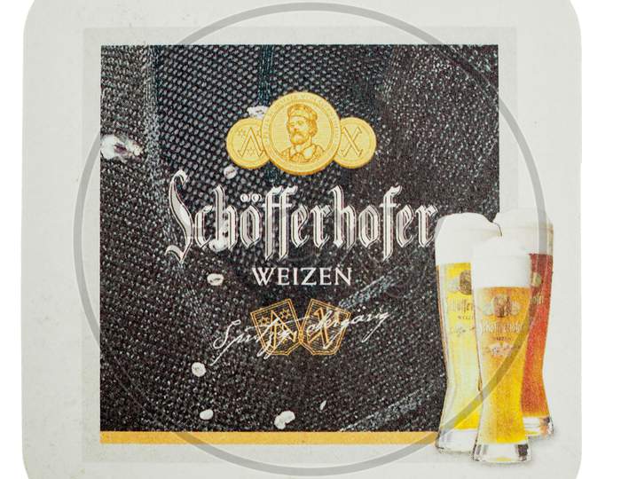 Berlin, Germany - March 15, 2015: Beermat Of German Beer Schoefferhofer Isolated Over White Background