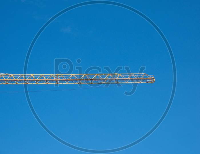 Construction Crane Over Sky With Copy Space