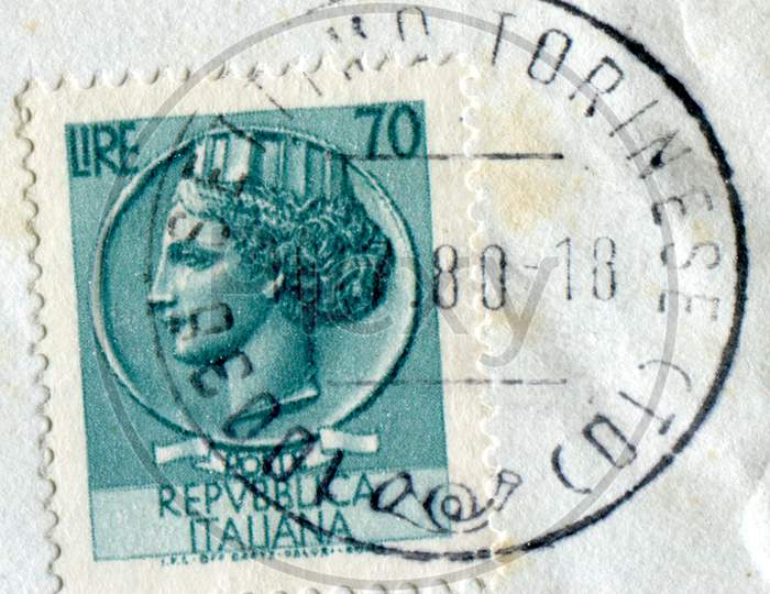 Settimo Torinese, Italy - Circa July 2016: A Stamp Printed By Italy Shows The Repubblica Italiana (Meaning Italian Republic) Represented As A Woman