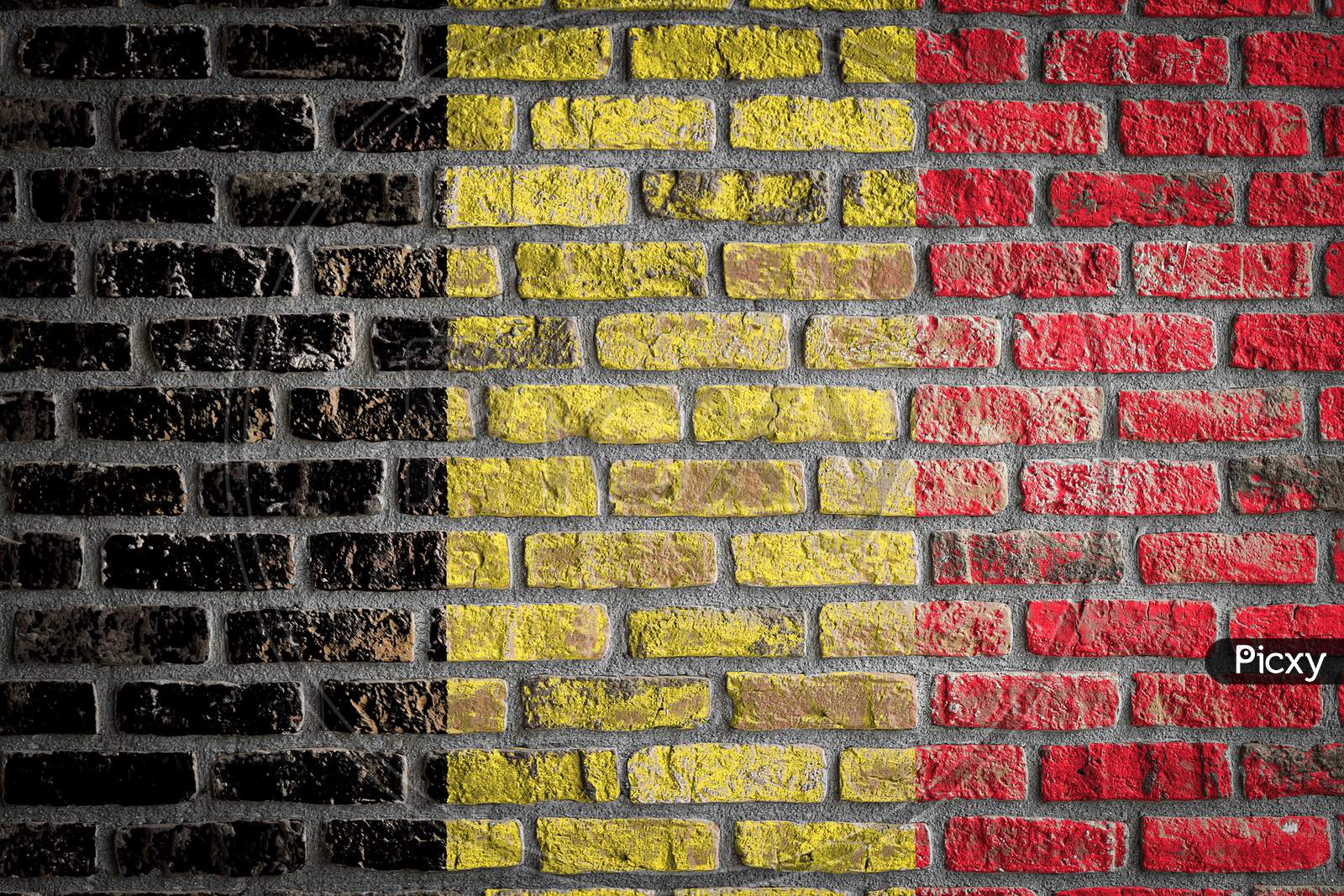 National Flag Of Belgium
 Depicting In Paint Colors On An Old Brick Wall. Flag  Banner On Brick Wall Background.