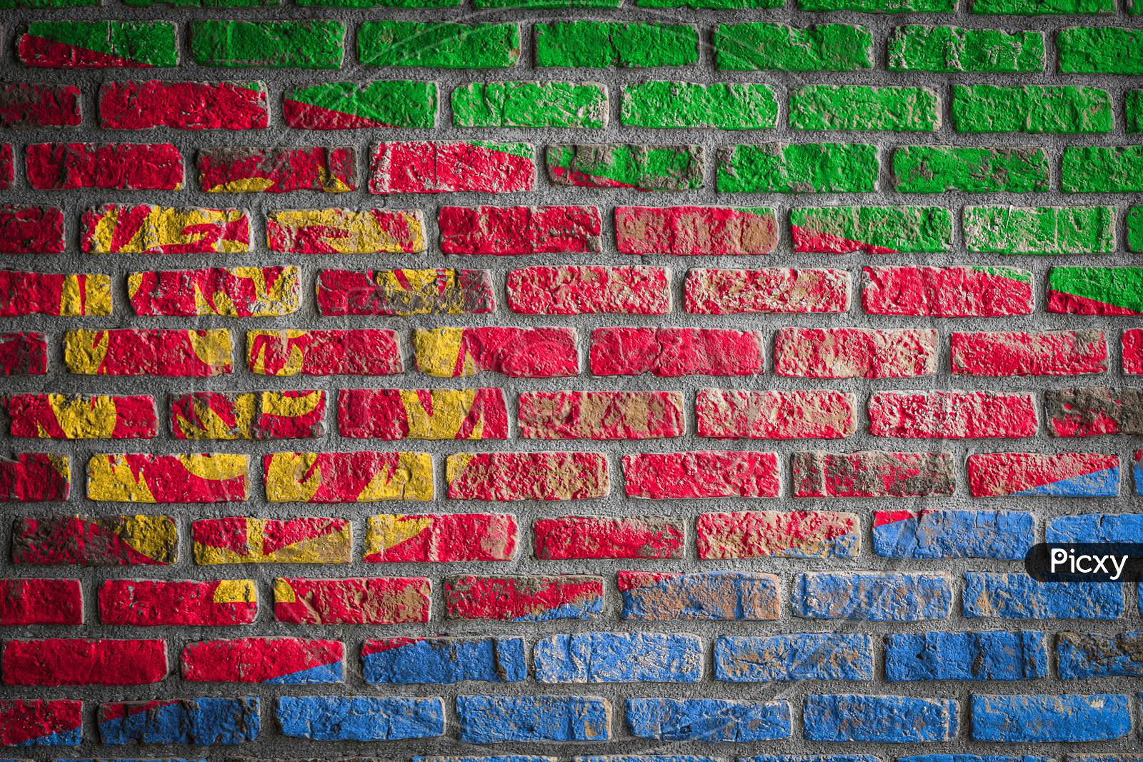 National Flag Of Eritrea
 Depicting In Paint Colors On An Old Brick Wall. Flag  Banner On Brick Wall Background.