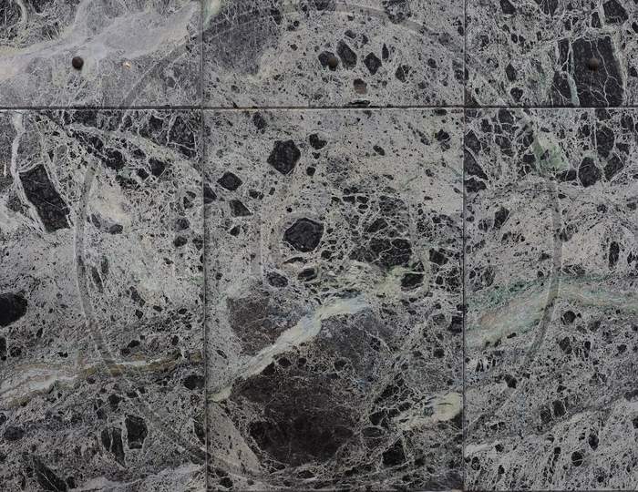 Glossy Green And Black Marble Texture Background