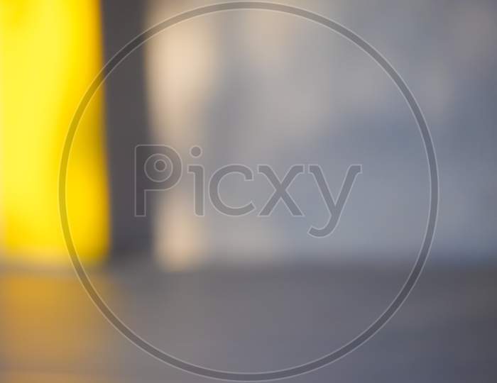 Abstract Yellow And Grey Blur Background With Copy Space