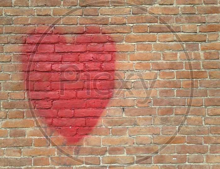 Red Heart On Wall With Copy Space