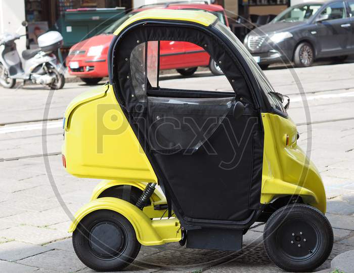 Turin, Italy - Circa July 2017: Small Electric Mail Delivery Vehicle Used By Poste Italiane (Meaning Italian Mail)
