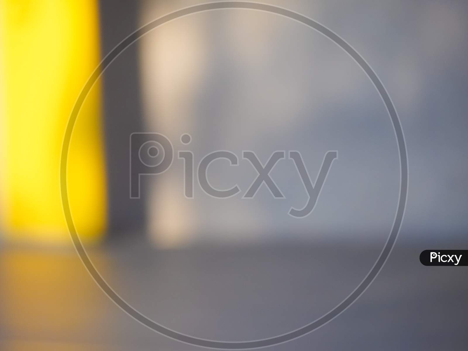 Abstract Yellow And Grey Blur Background With Copy Space