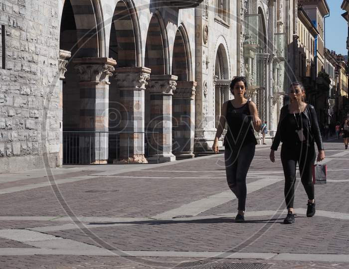 Como, Italy - Circa April 2017: Girls Walking In The Old City Centre