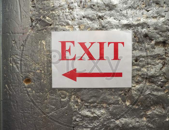 Exit Sign With Direction Arrow