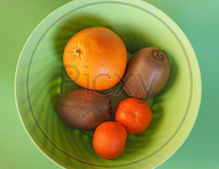 Fruits In Plastic Bowl