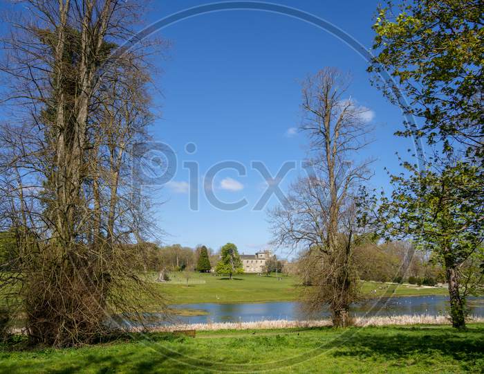 Swindon, Wiltshire, Uk -April 25 : View Of Lydiard Park Showing A Distant View Of The Palladian House Near Swindon Wiltshire On April 25, 2021. Unidentified People