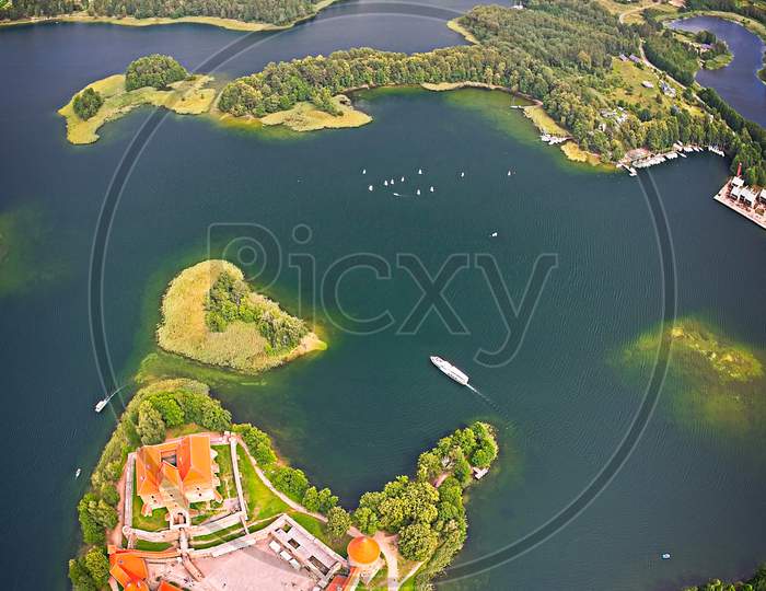 Trakai Castle In Lithuania Aerial View. Green Islands In Lake In Trakai Near Vilnius. Trakai Drone View