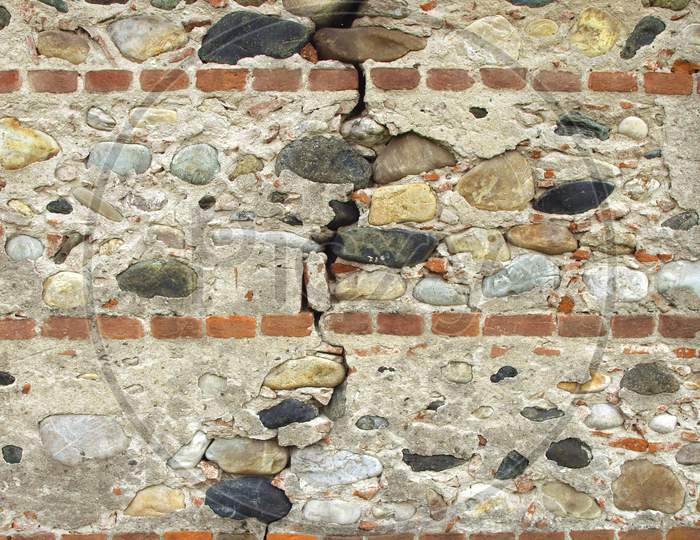 Cracked Brick And Stone Wall