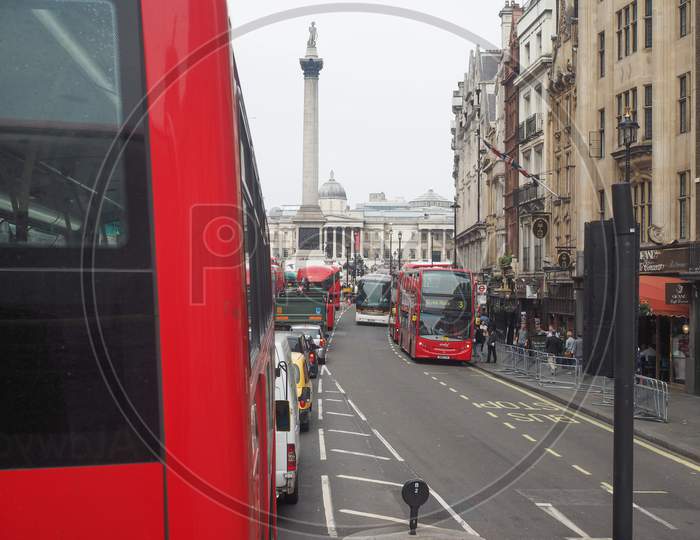 London, Uk - June 12, 2015: Red Double Decker Buses Are A Traditional Landmark Of London