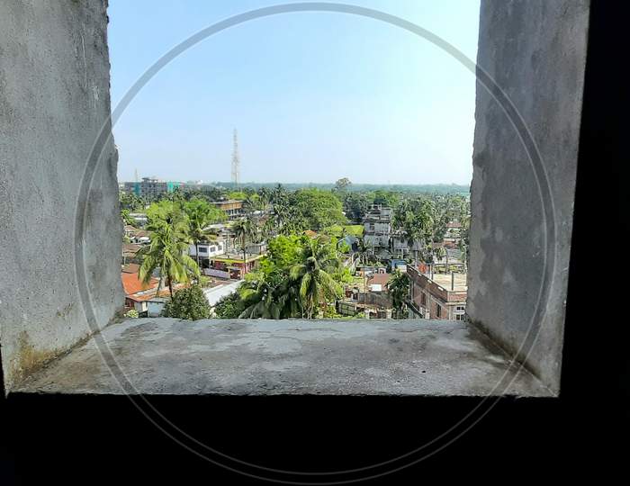 Landscape view through the window of Bongaigaon Town from the Bindavan Housing Complex, Bongaigaon Town, Assam