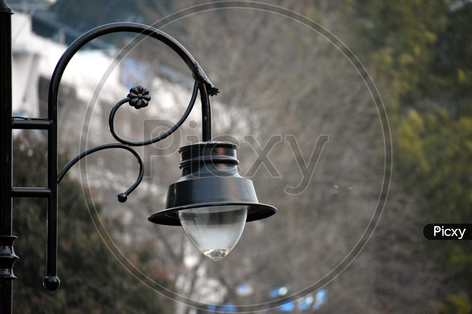Beautiful Picture Of Black Road Side Lamp In India. Background Blur