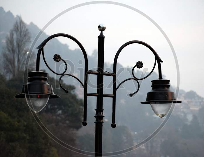 Beautiful Picture Of Black Road Side Lamp In India. Background Blur