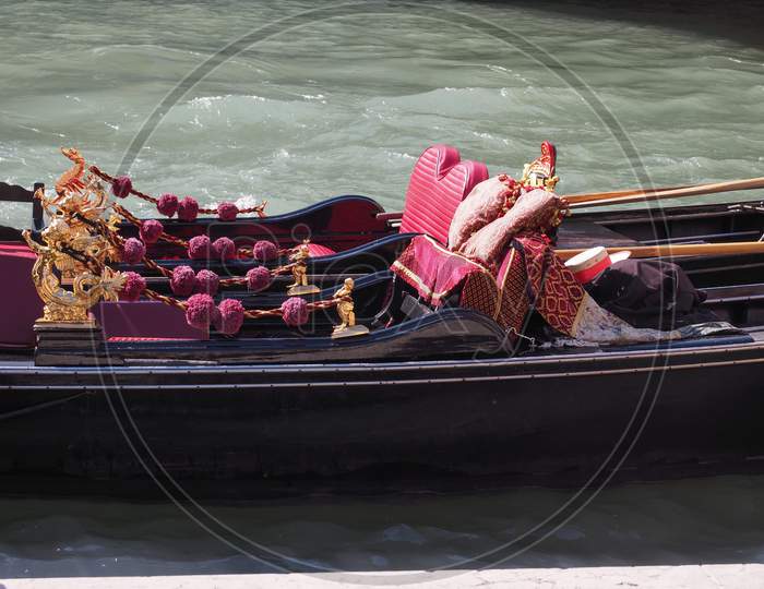 Venice, Italy - Circa September 2016: Gondola Traditional Flat Bottomed Rowing Boat In The Venetian Lagoon