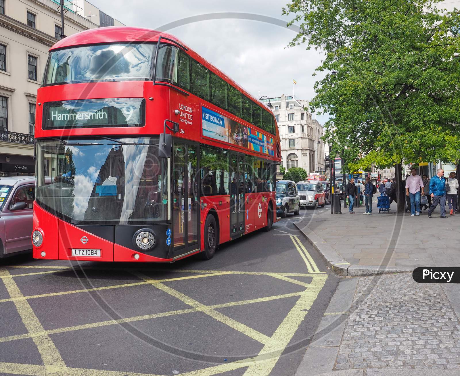 London, Uk - June 09, 2015: Red Double Decker Buses Are A Traditional Landmark Of London
