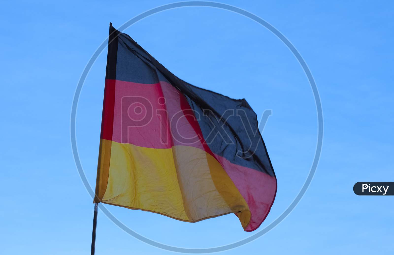 German Flag Of Germany Over Blue Sky
