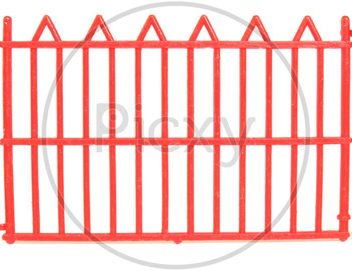 Red Plastic Fence Isolated Over White