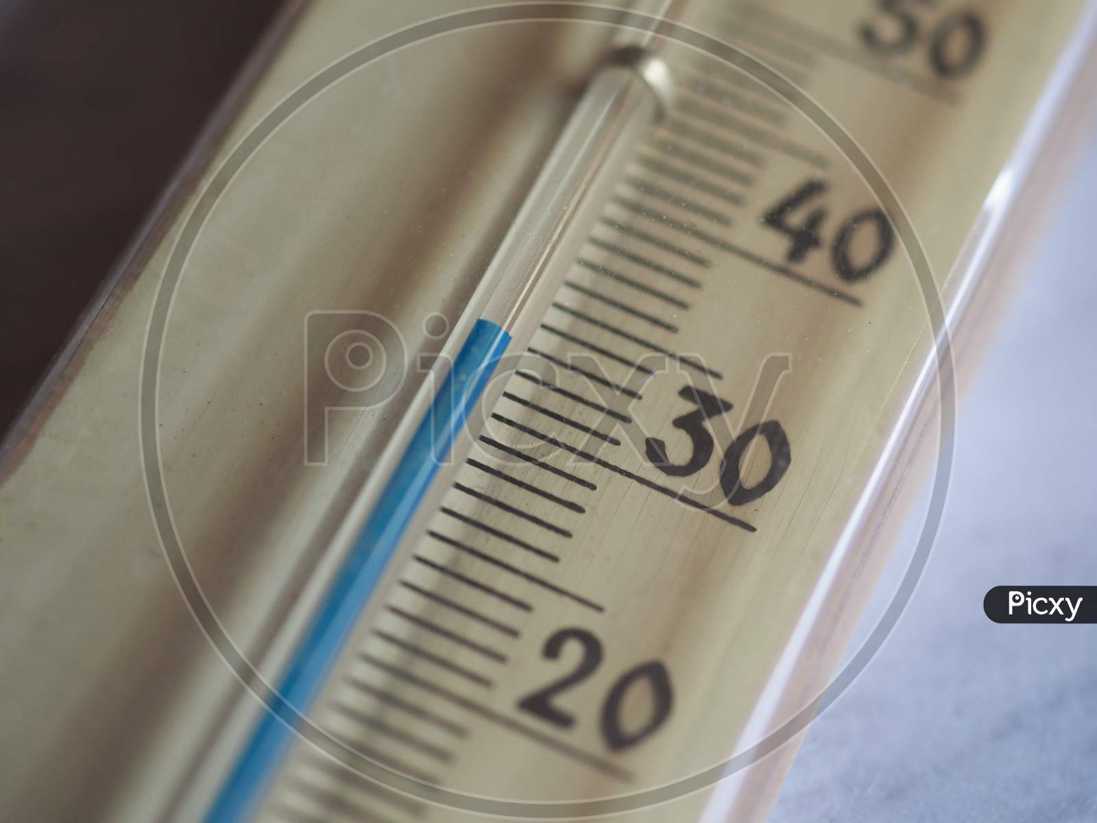Thermometer Showing 33 C Or 33 F Degrees