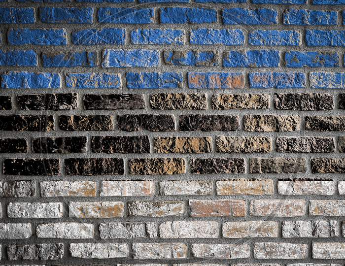 National Flag Of Estonia
 Depicting In Paint Colors On An Old Brick Wall. Flag  Banner On Brick Wall Background.