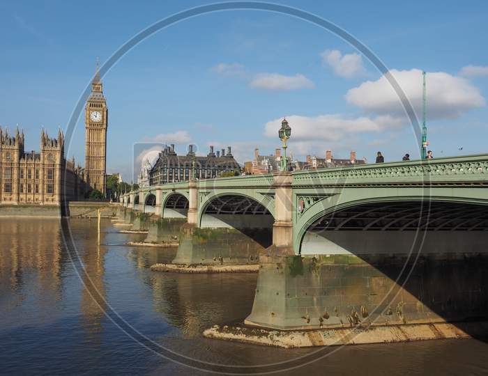 London, Uk - September 28, 2015: Tourists On Westminster Bridge At The Houses Of Parliament Aka Westminster Palace