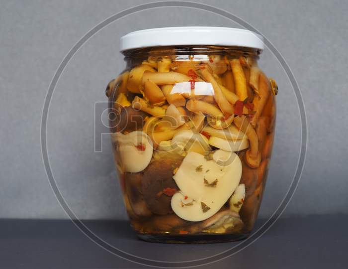 Mixed Champignons And Porcini Mushrooms In Jar