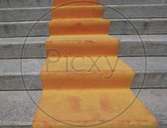 Orange Red Carpet On Stairway
