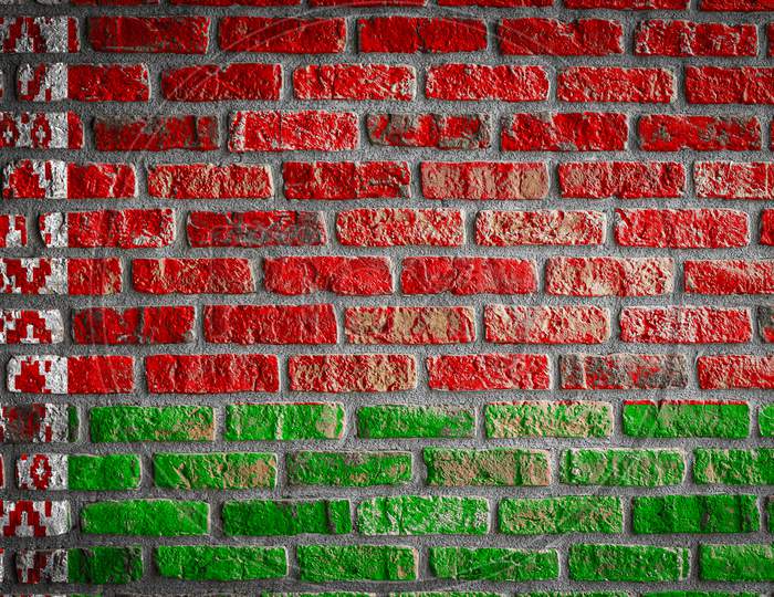 National Flag Of Belarus
 Depicting In Paint Colors On An Old Brick Wall. Flag  Banner On Brick Wall Background.