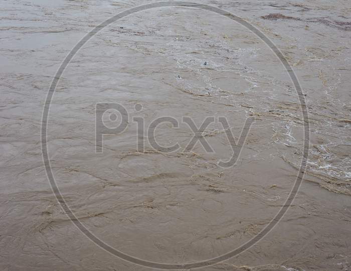 Brown Muddy Water Surface Background