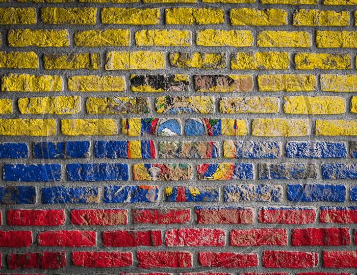 National Flag Of Ecuador
 Depicting In Paint Colors On An Old Brick Wall. Flag  Banner On Brick Wall Background.