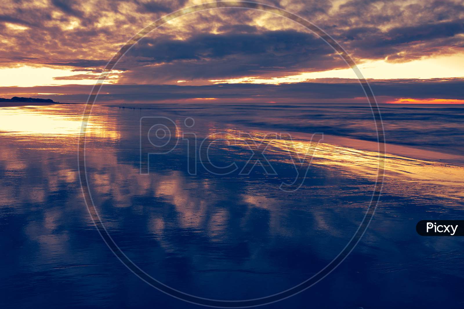 Incredible Colors During Sunrise. Reflections In The Sea Water. Holiday Landscape.