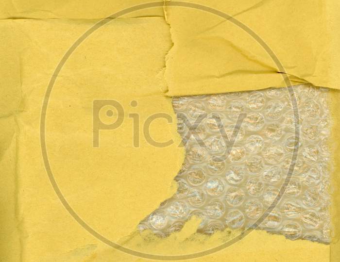 Yellow Paper And Bubble Wrap Texture Background