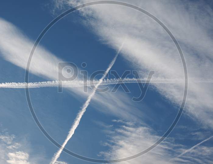 Plane Trails In The Sky