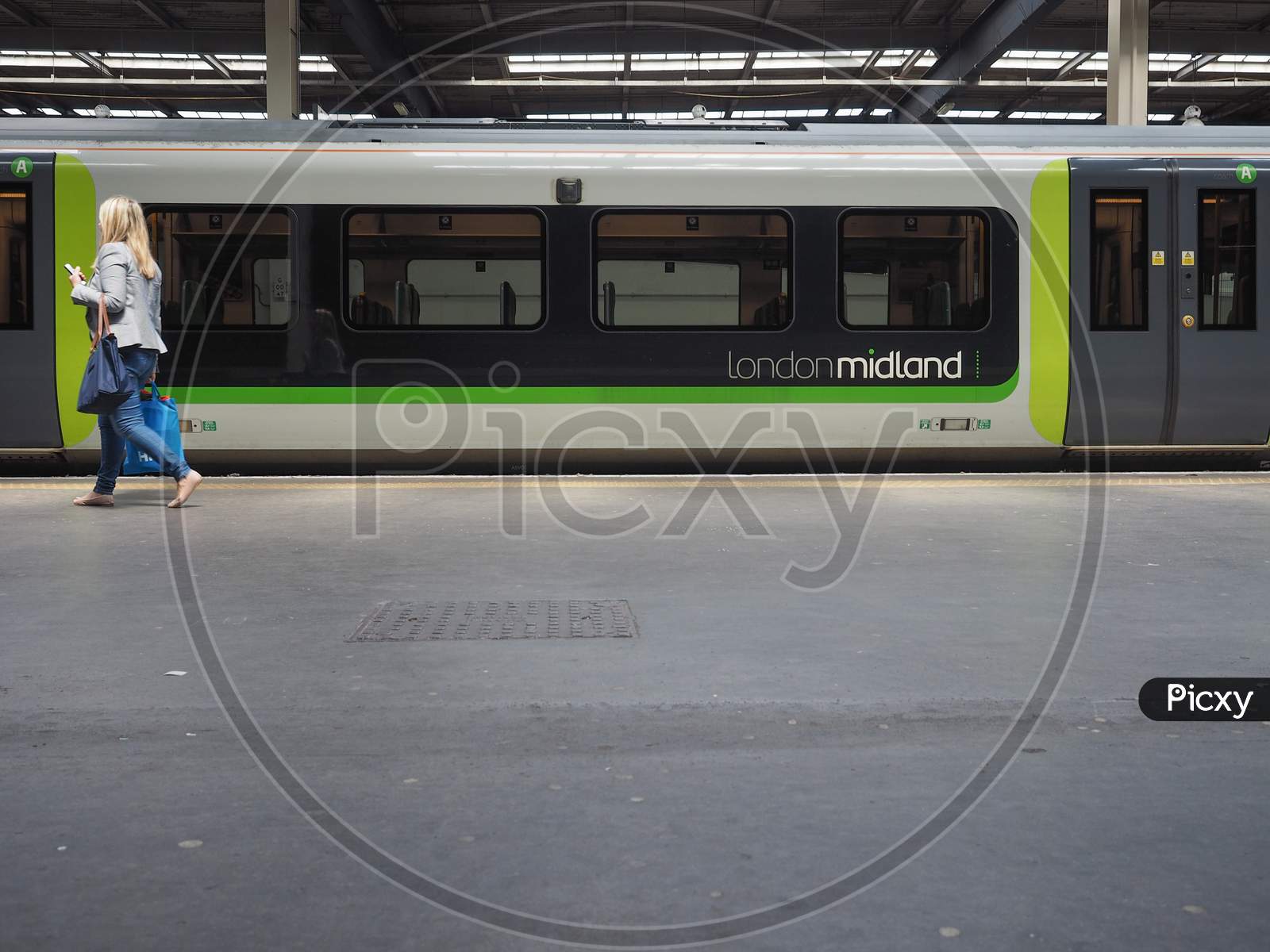 London, Uk - Circa June 2016: London Midland Train At London Euston Train Station