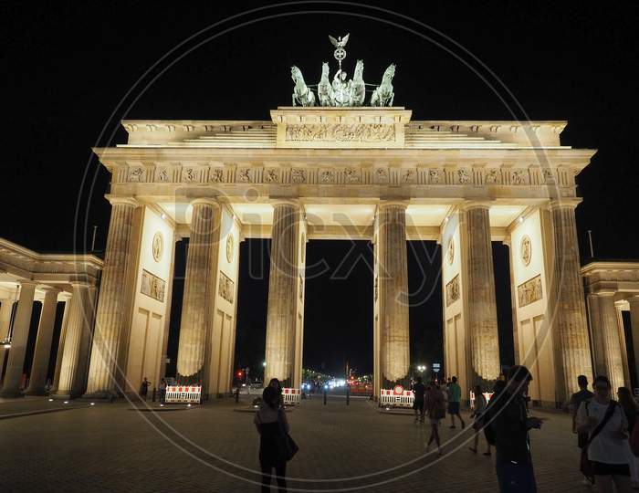Berlin, Germany - Circa June 2016: Tourists At Brandenburger Tor (Meaning Brandenburg Gate) At Night