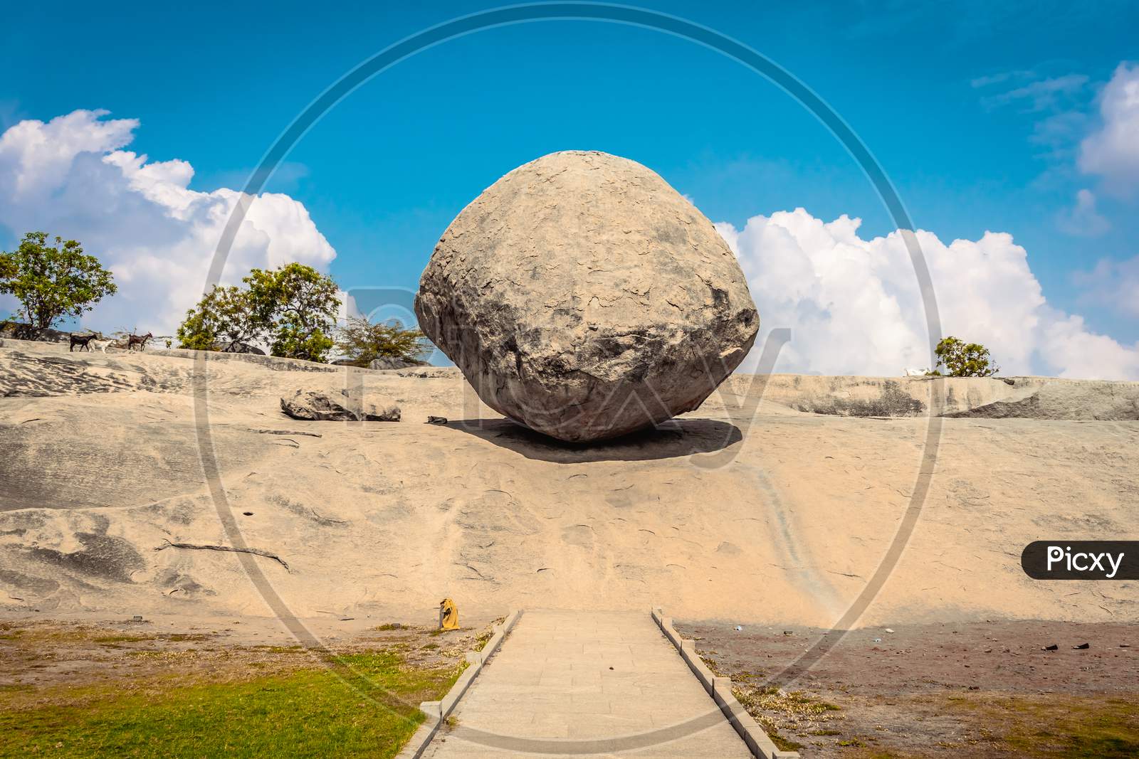 Krishna Butter Ball is UNESCO's World Heritage Site located at Mamallapuram or Mahabalipuram in Tamil Nadu, South India